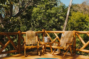 Exclusive Cabin, Jetted Tub, Garden View | Terrace/patio