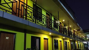 A hotel with a modern design, featuring a second-floor balcony with a geometric railing. - Hotel Dine & Dream (Kathmandu)