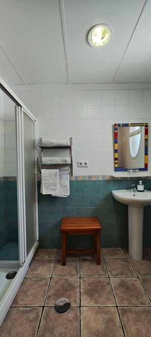 Shower, free toiletries, hair dryer, towels