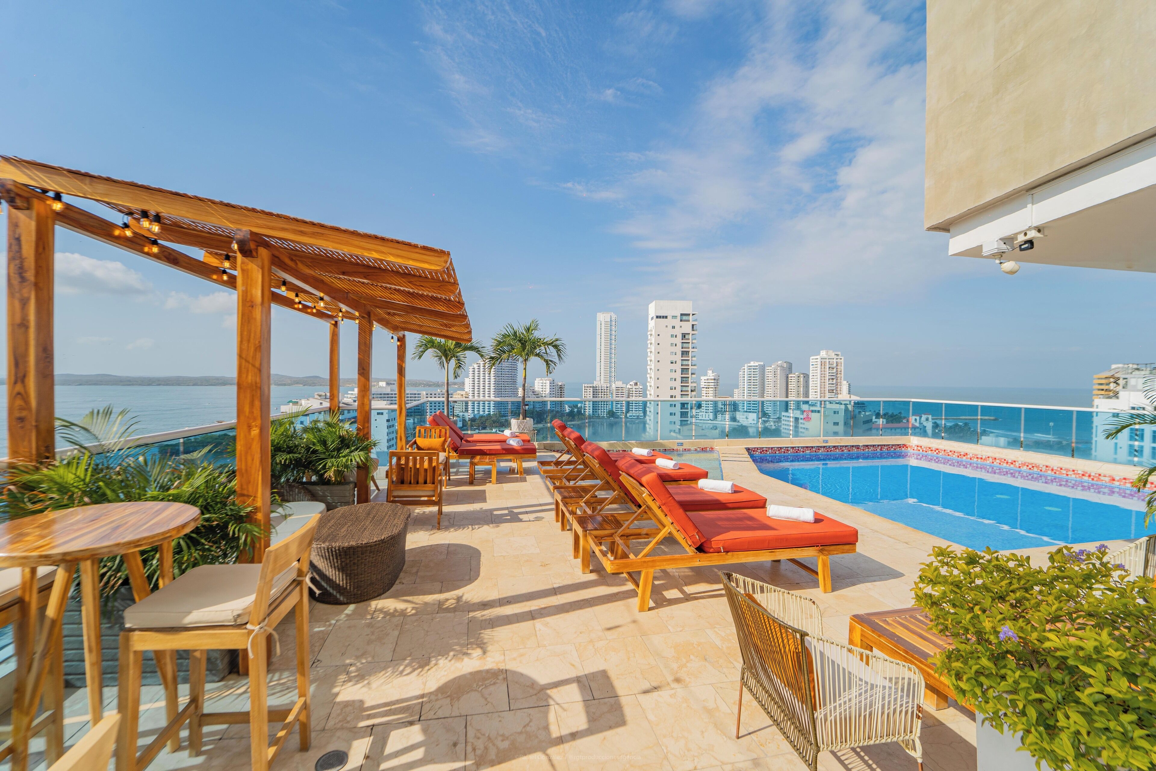 Outdoor pool, open 9:00 AM to 7:00 PM, pool umbrellas