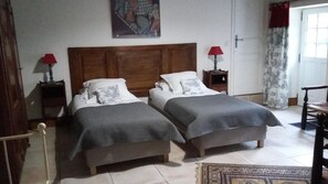 Individually decorated, individually furnished, desk, rollaway beds