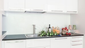 Apartemen, 2 kamar tidur | Dapur pribadi | Lemari es, microwave, oven, dan kompor