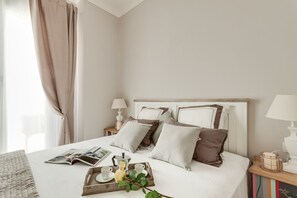 2 habitaciones, tabla de planchar con plancha, cunas y wifi gratis 