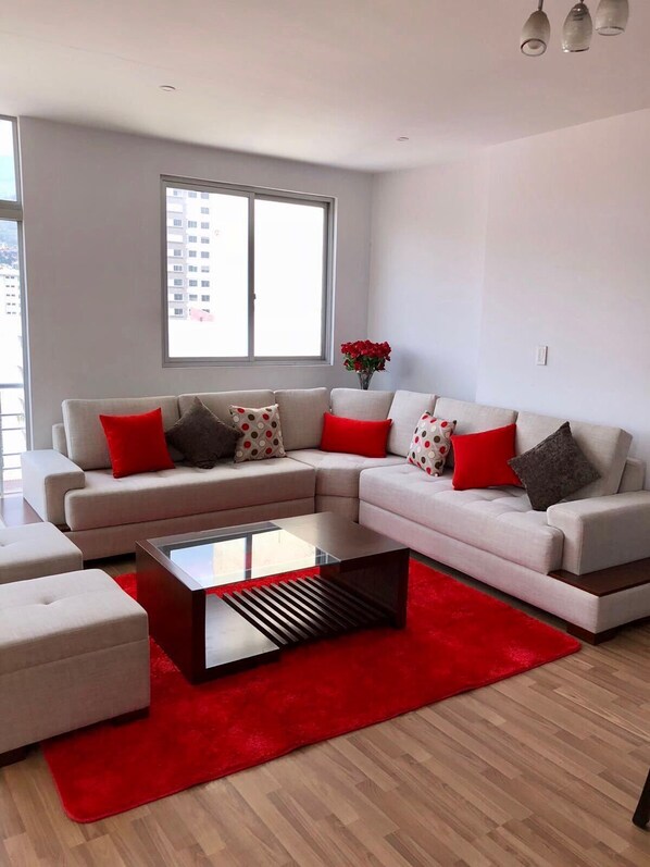 Deluxe Apartment, 4 Bedrooms, Private Bathroom | Living area | Flat-screen TV - EDIFICIO TORRE ESTEBAN (Cochabamba)