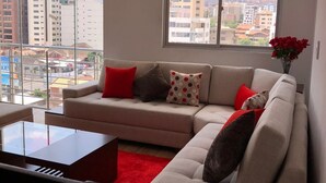 Deluxe Apartment, 4 Bedrooms, Private Bathroom | Living area - EDIFICIO TORRE ESTEBAN (Cochabamba)