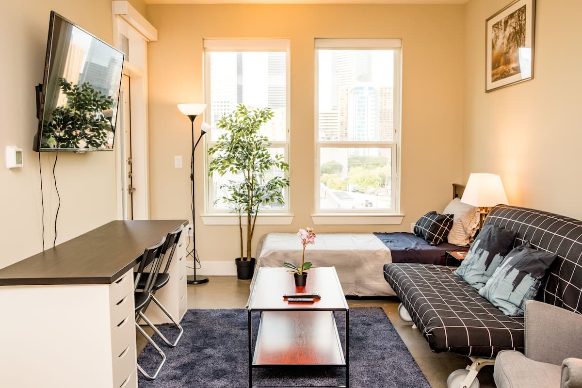 Luxury Suite, 1 Queen Bed with Sofa bed, Accessible, City View | Living room | Flat-screen TV, Netflix, pay movies