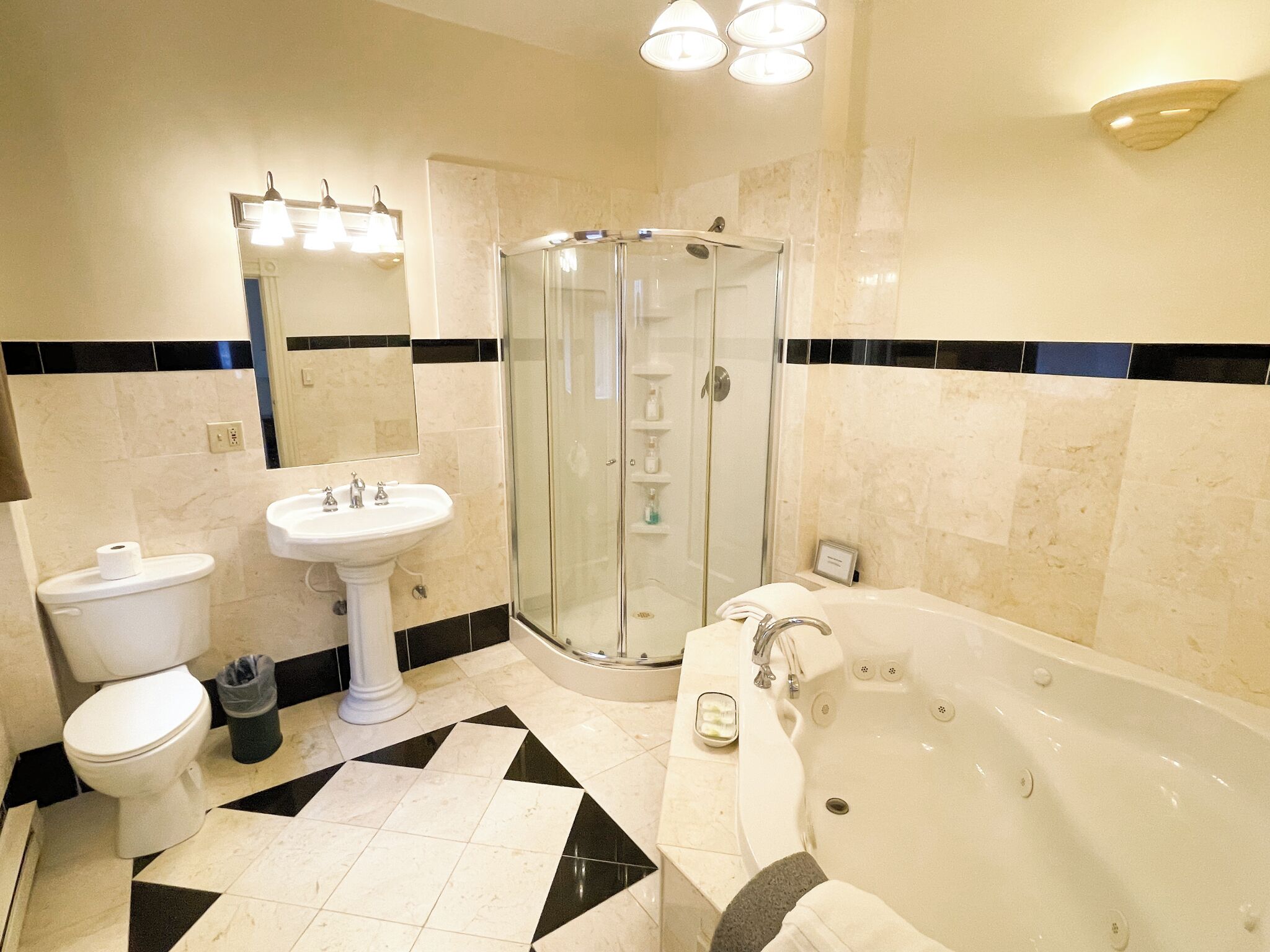 luxury suite | bathroom | combined shower/bathtub, hair dryer, towels, soap