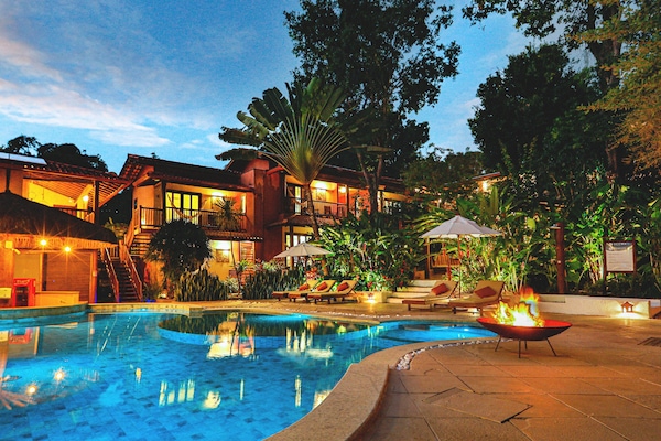 Outdoor pool, open 8:00 AM to 10:00 PM, pool umbrellas, pool loungers