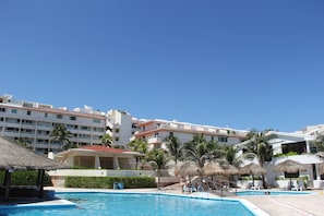 Outdoor pool, pool umbrellas, pool loungers