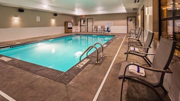 Indoor pool, open 7:00 AM to 10:00 PM, pool loungers