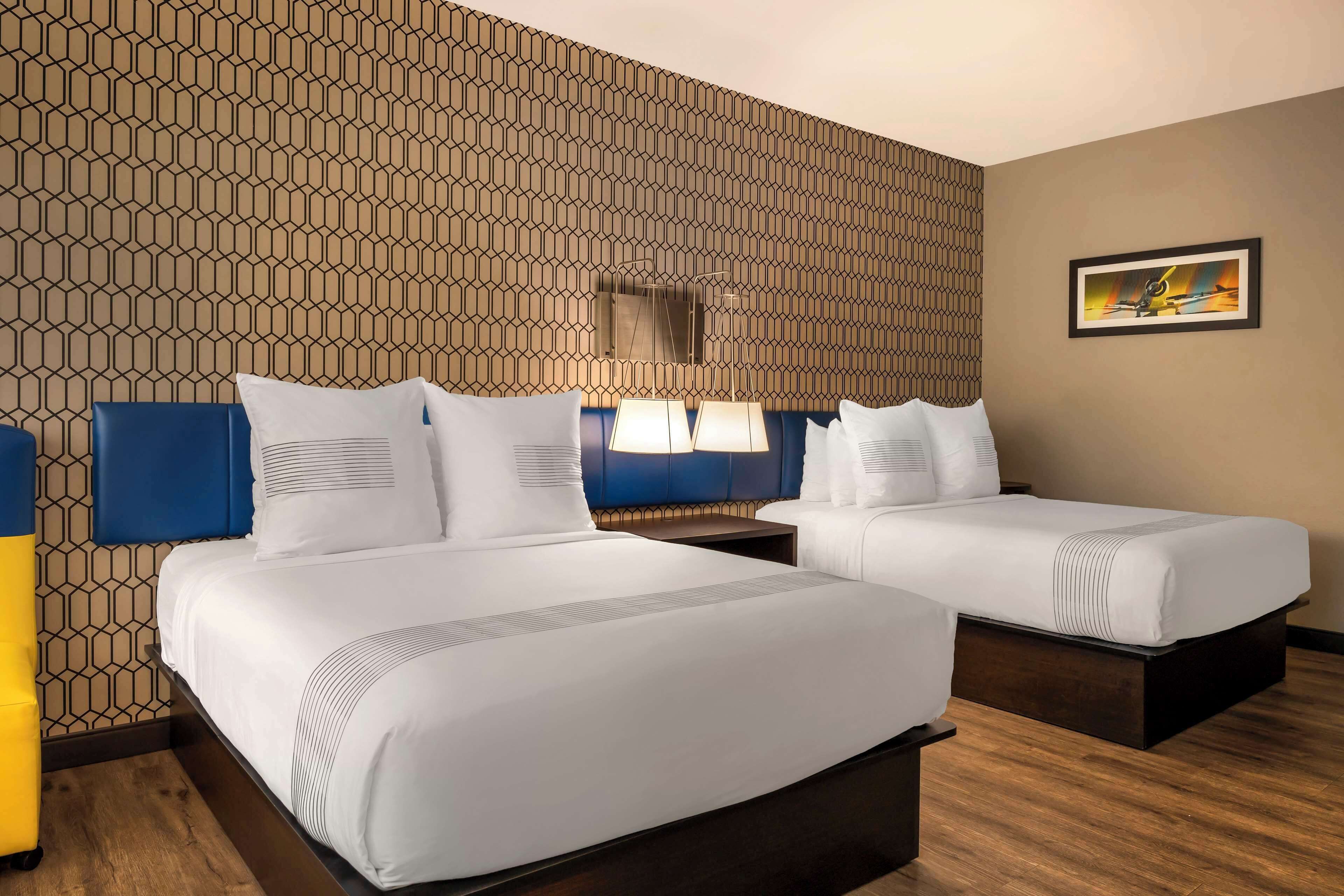 standard room, 2 queen beds, non smoking, refrigerator & microwave | 1 bedroom, premium bedding, in-room safe, desk