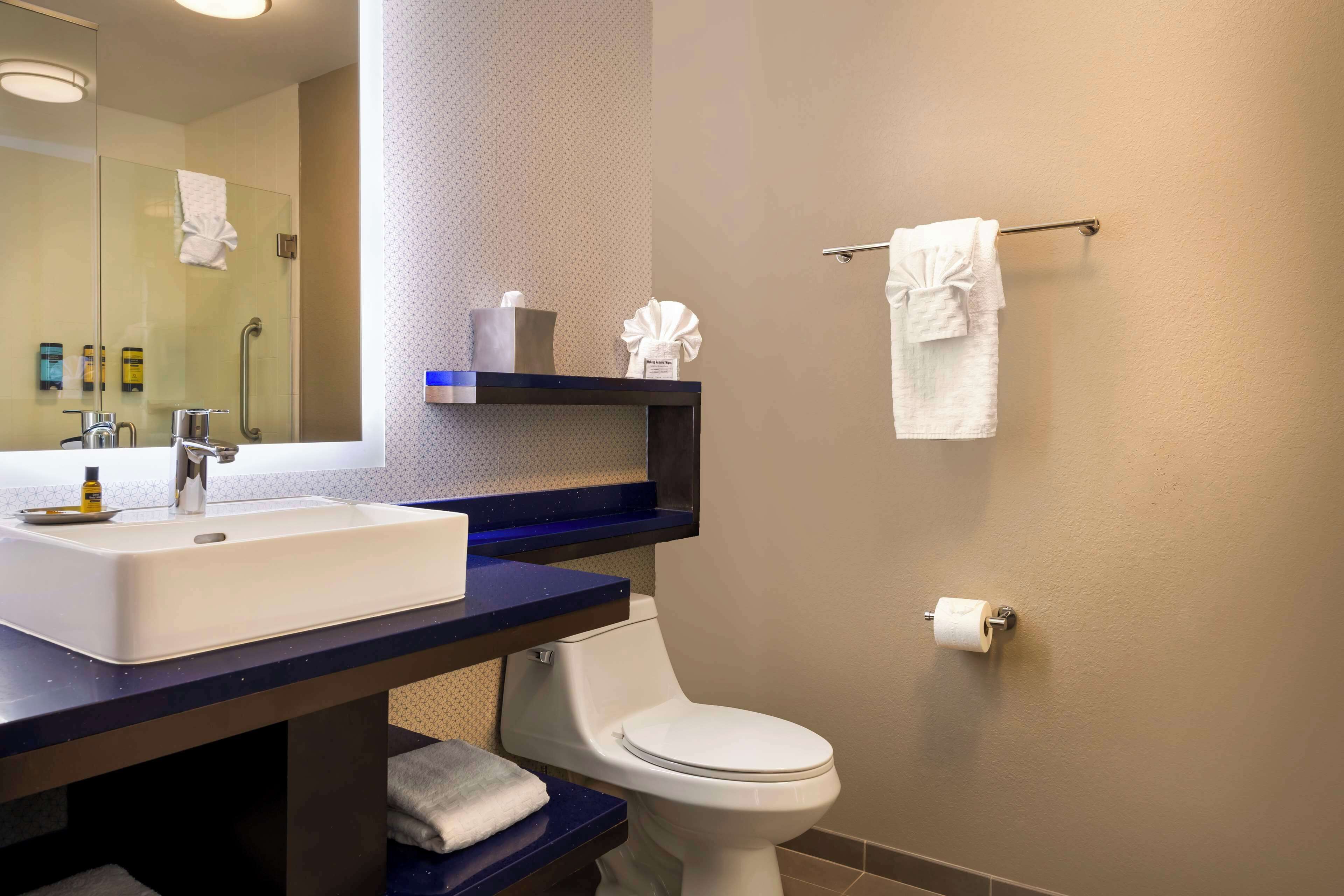 standard room, 2 queen beds, non smoking, refrigerator & microwave | bathroom | free toiletries, hair dryer, towels, soap