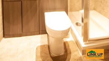 Studio Room 2 | Bathroom | Designer toiletries, hair dryer, towels, soap