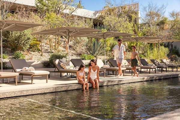4 outdoor pools, cabanas (surcharge), pool umbrellas