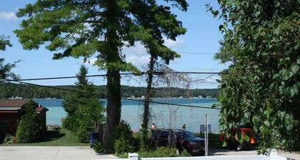 Torch River Retreat: The Perfect Summer Getaway – Private Dock, Beach Access & More!