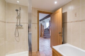 Bathtub, hair dryer, towels, soap