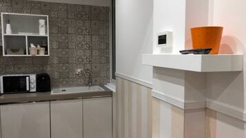 Fridge, microwave, coffee/tea maker, toaster