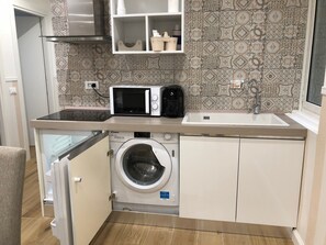 Fridge, microwave, coffee/tea maker, toaster