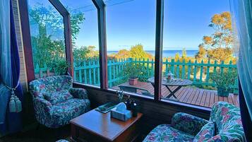 Romantic Double Room, 1 Queen Bed, Sea View | 1 bedroom, free minibar, individually decorated, individually furnished