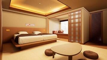 A modern bedroom with a large bed, a small round table, and a traditional sliding door.