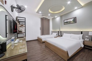 Family Room | Minibar, in-room safe, blackout curtains, iron/ironing board - A25 Hotel - 185 - 187 Lo Duc (Hanoi)