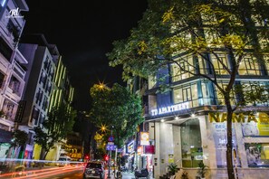A hotel with a modern facade, large windows, and a prominent 'TD APARTMENT' sign. - TD Central Hotel & Apartment (Ho Chi Minh City)