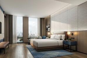 Minibar, desk, blackout curtains, iron/ironing board