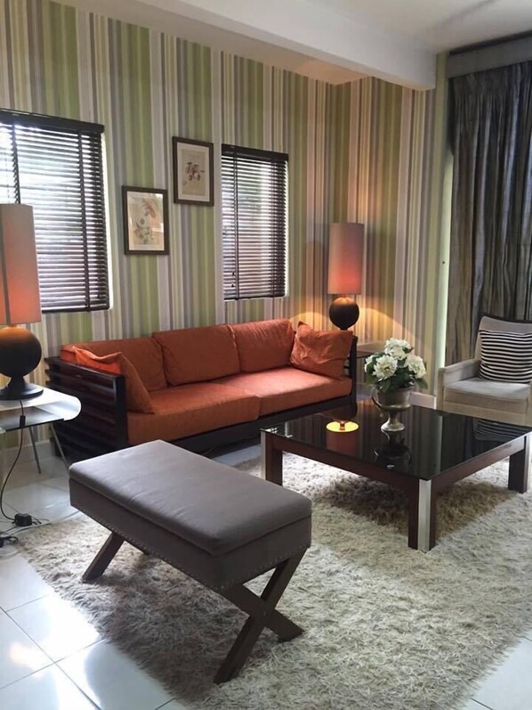 Standard Condo, 2 Bedrooms, Balcony, Poolside | Living area | 32-inch LCD TV with satellite channels, TV