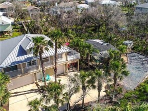 Exterior - Beach Home with Amazing Oasis Pool, Spa, Waterfall, Fire Pit, Bikes (Palm Coast)