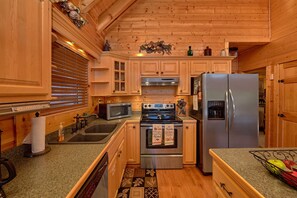 Fridge, microwave, oven, stovetop - Tuckered Bears. The Mountains are Calling!! Family Cabin. Sleeps 6. Hot Tub. Pool Table. VIEWS!!! (Sevierville)