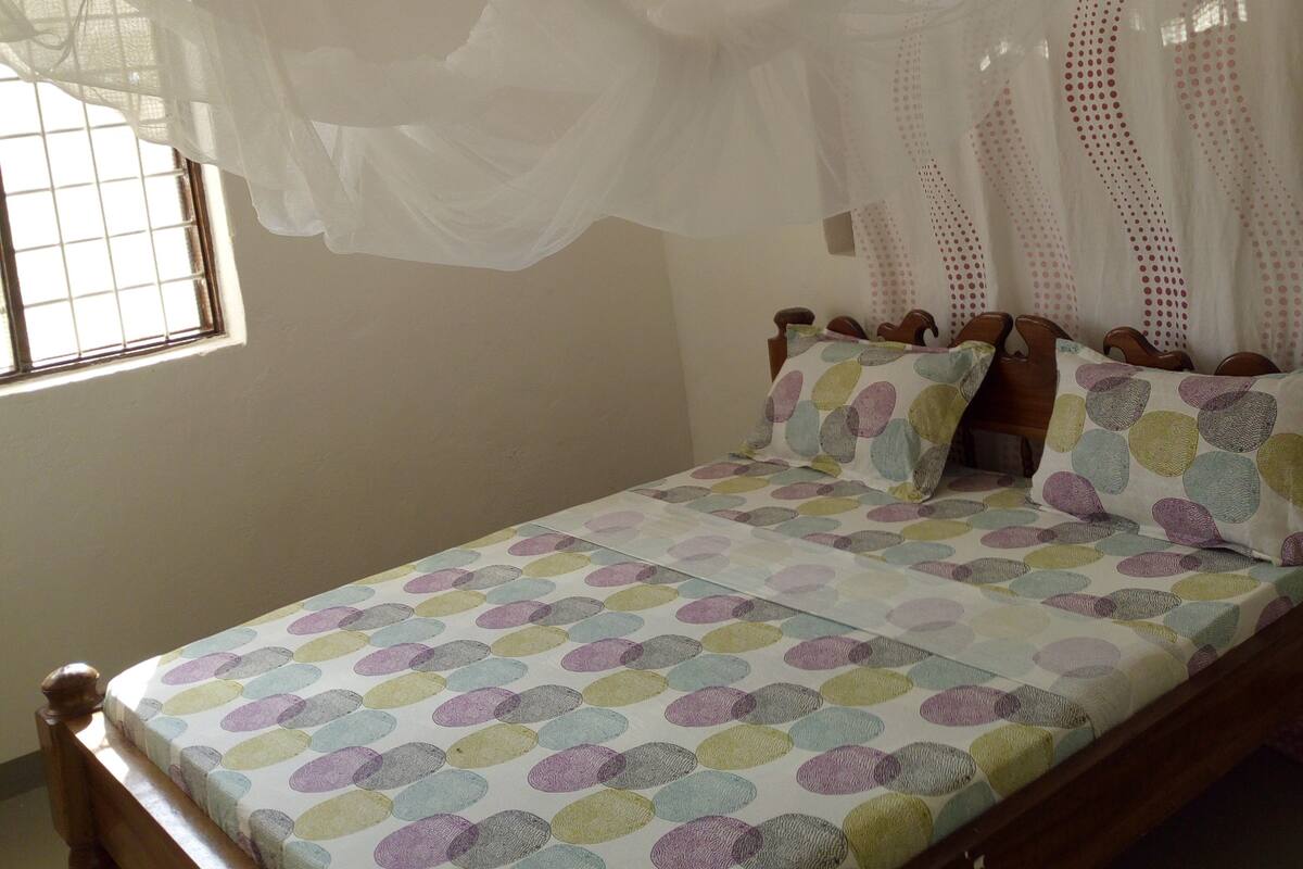 Blackout curtains, iron/ironing board, free WiFi, bed sheets