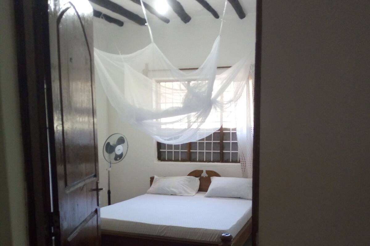 Blackout curtains, iron/ironing board, free WiFi, bed sheets