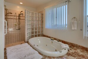 Shower, jetted tub, towels