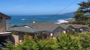 A coastal residential area with houses overlooking the ocean. - Bristol By the Sea: 3  BR, 3  BA House in Cambria, Sleeps 8 (Cambria)