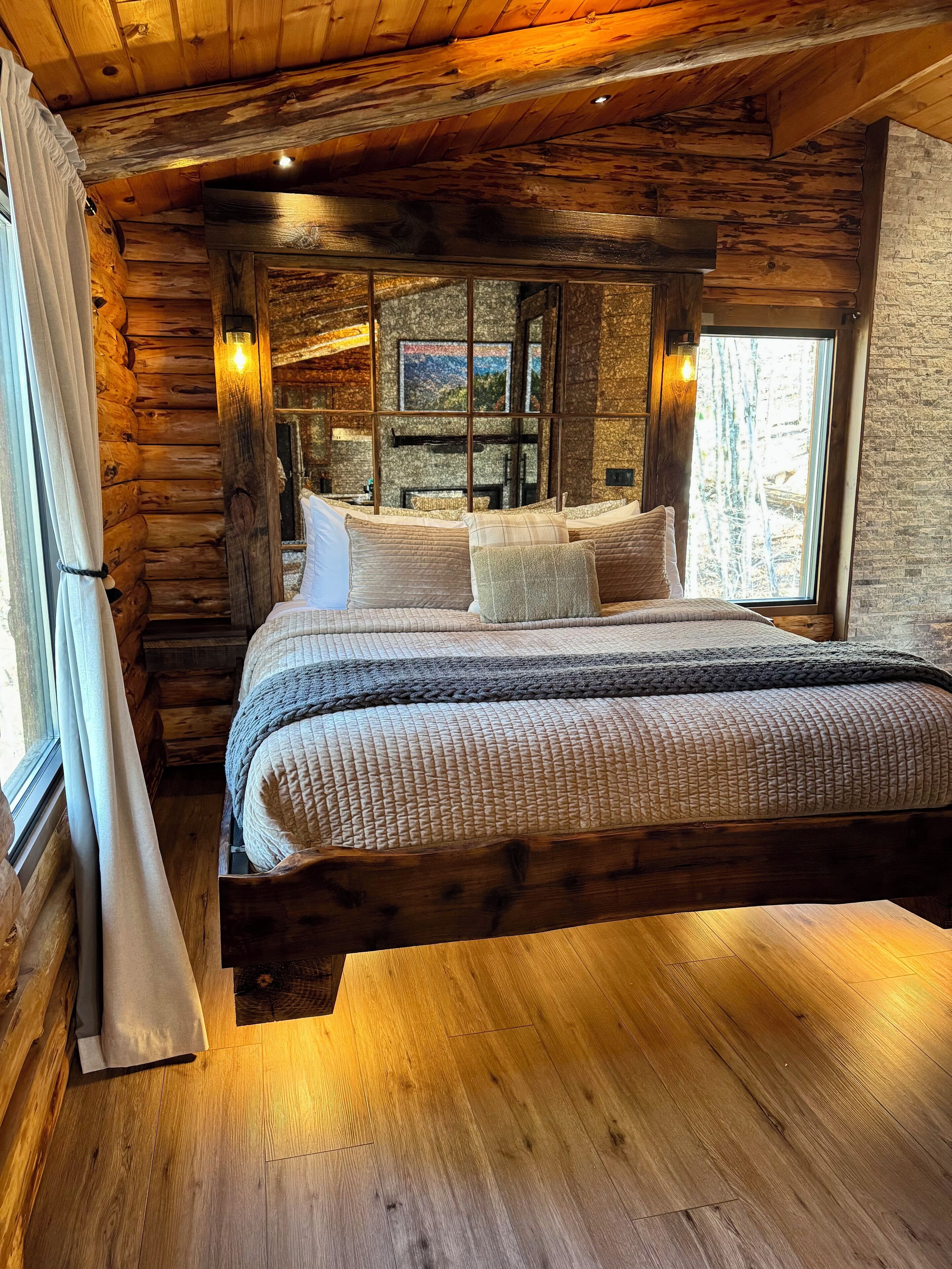 Romantic Pigeon Forge cabin with king bed, fireplace, hot tub & luxury soaking tub. Perfect Smoky Mountain honeymoon retreat with cozy rustic charm. Private, peaceful, and minutes to Dollywood & Parkway.