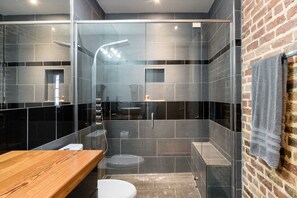 Shower, eco-friendly toiletries, hair dryer, towels