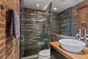 Shower, eco-friendly toiletries, hair dryer, towels