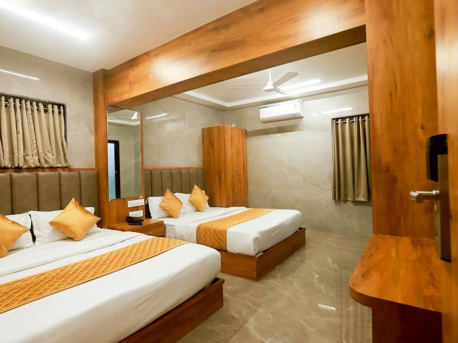 Deluxe Quadruple Room | Premium bedding, free WiFi, bed sheets