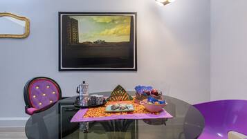 Deluxe Suite, 2 Bedrooms (Home Naples) | Living area | 32-inch flat-screen TV with cable channels, TV