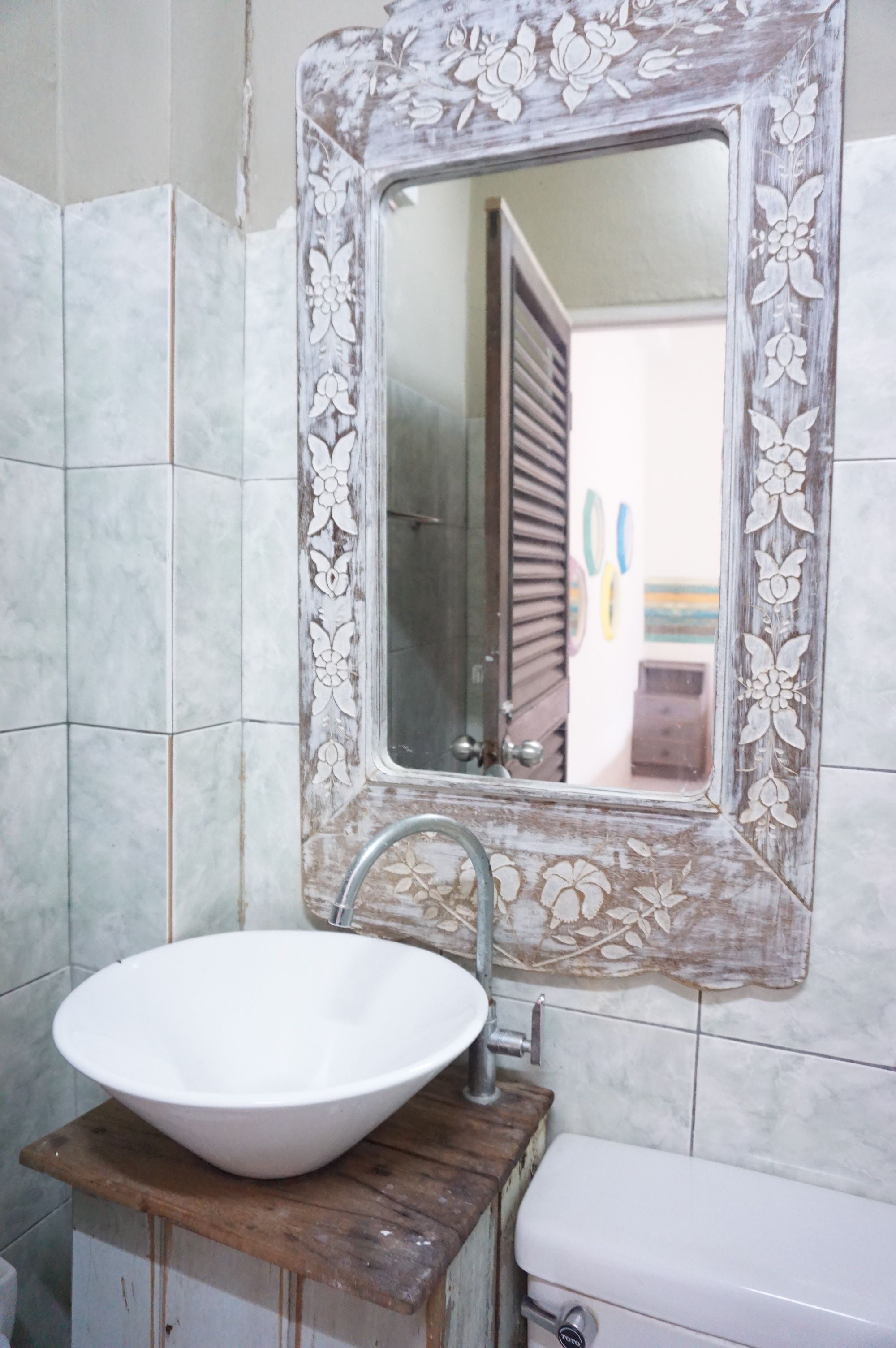 bike room - twin bed | bathroom sink