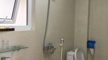 Shower, free toiletries, hair dryer, slippers