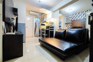 Apartment, 2 Bedrooms | Living area | LCD TV - Monochrome Style 2 Bedrooms at Kalibata City Apartment By Travelio (Jakarta)