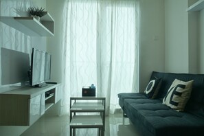 Apartment, 2 Bedrooms | Living room | Flat-screen TV - 2 Bedrooms Woodland Park Apartment by Travelio (Jakarta)