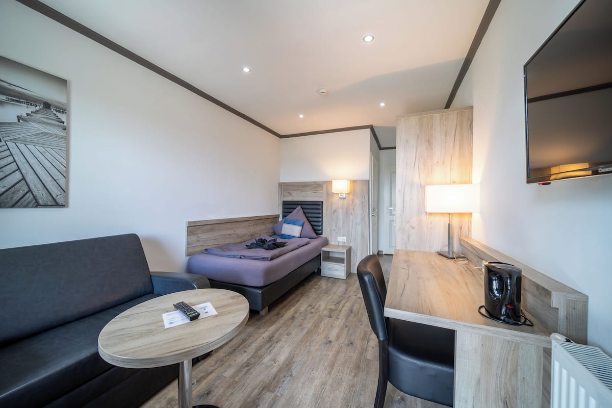 single room, canal view | 1 bedroom, premium bedding, desk, iron/ironing board