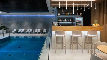 Indoor pool, open 7:00 AM to 9:00 PM, sun loungers