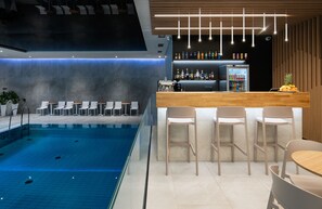 Indoor pool, open 7:00 AM to 9:00 PM, sun loungers