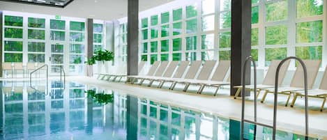 Indoor pool, open 7:00 AM to 9:00 PM, sun loungers