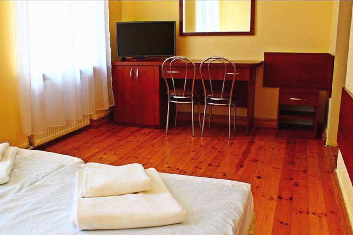 Desk, free WiFi, bed sheets