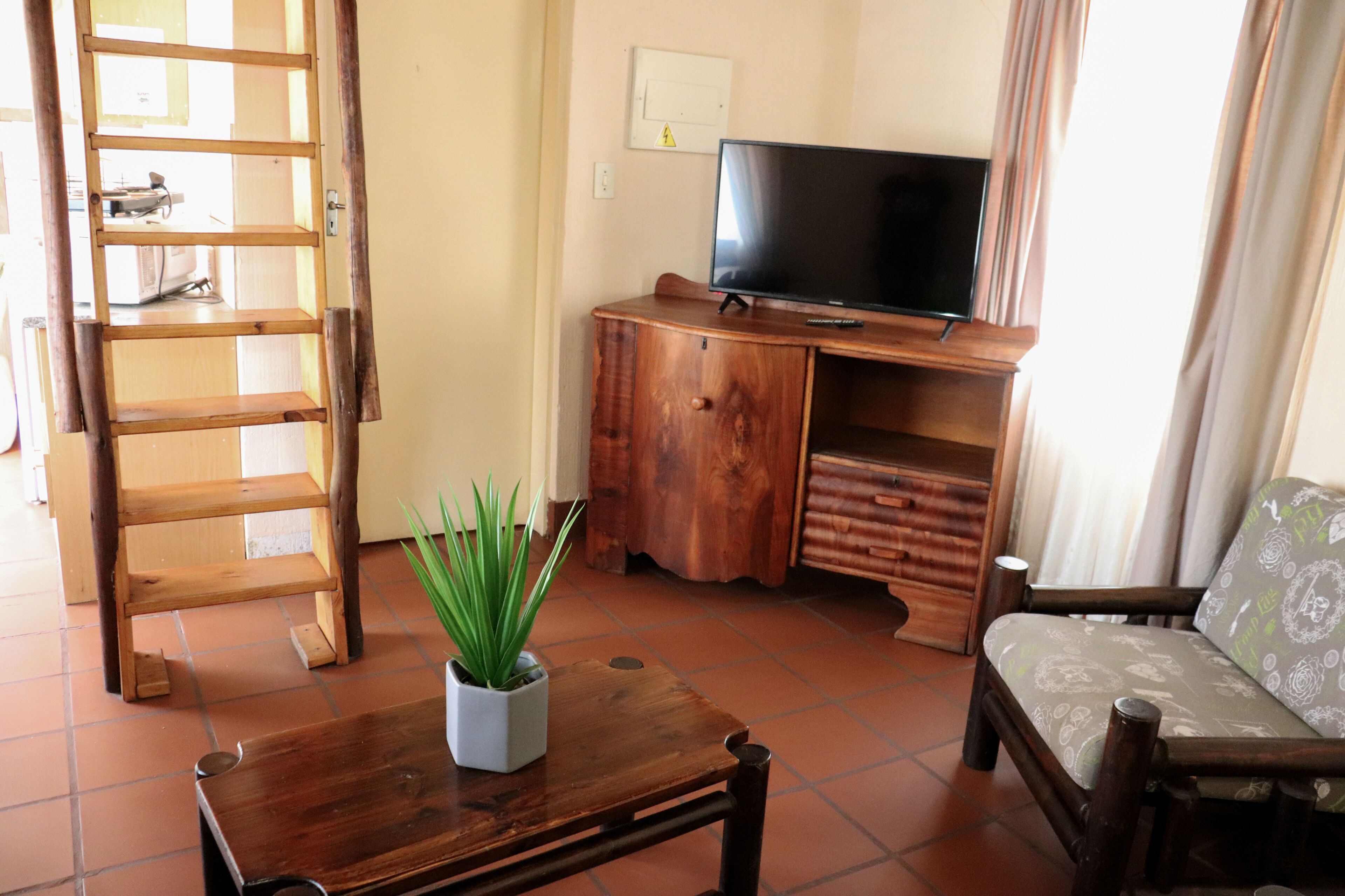 family chalet | living area | 40-inch led tv with satellite channels