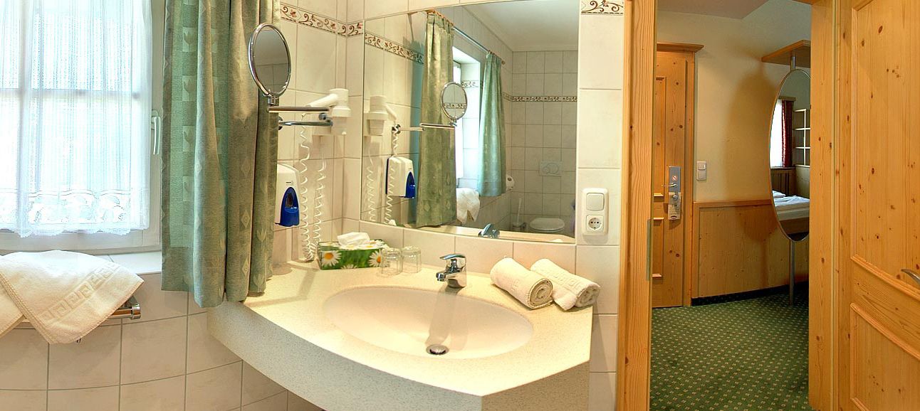 superior double room | bathroom | shower, rainfall showerhead, hair dryer, bathrobes